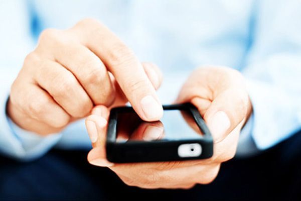 Hands using a smartphone